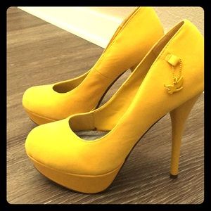 Yellow suede platform heels